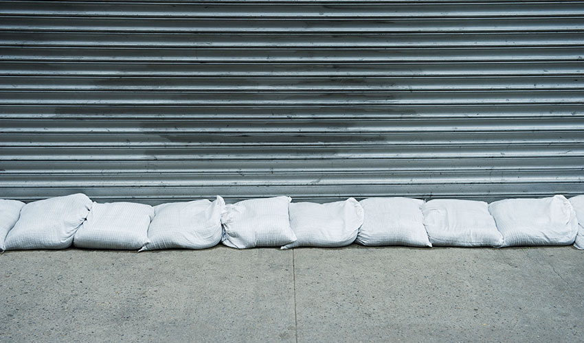 sandbags protecting metal doors