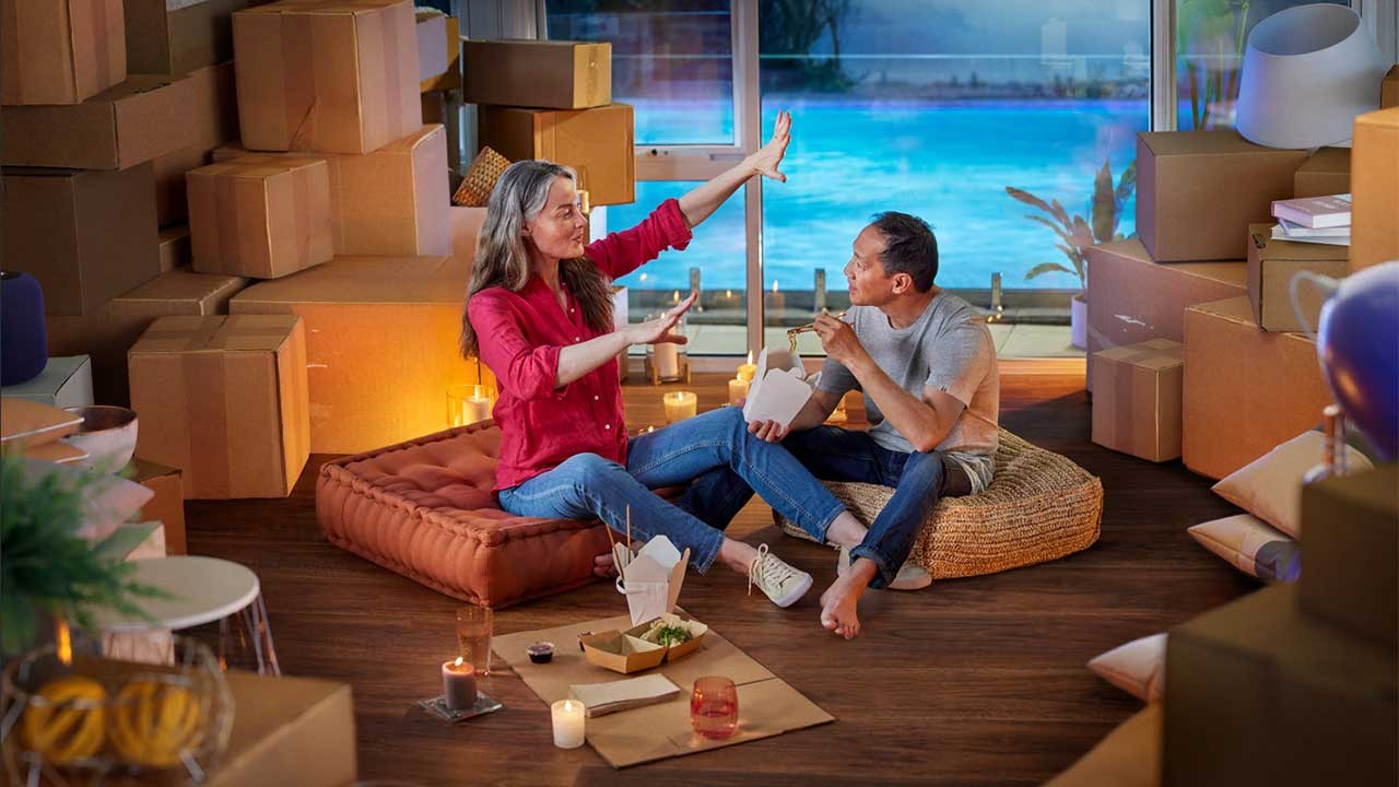 couple having picnic in living room