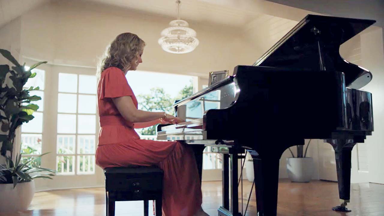 woman playing piano