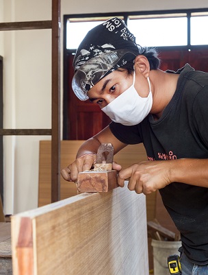 a man with crafts working