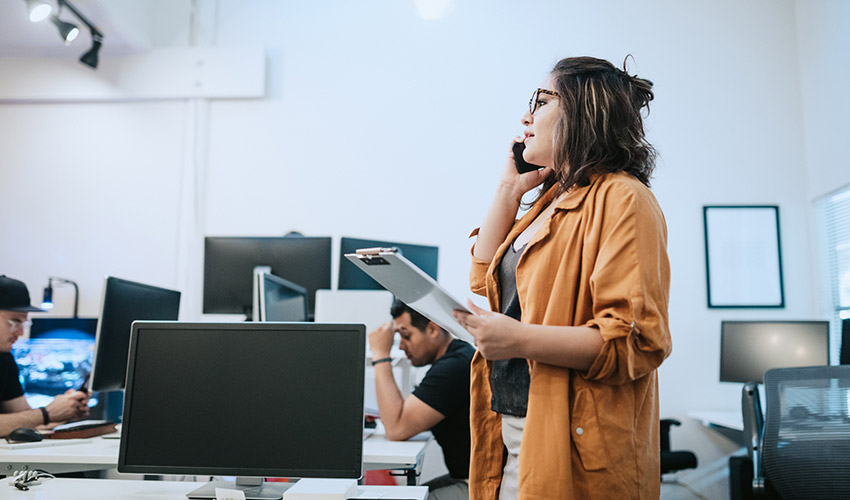 Woman on the phone in office 