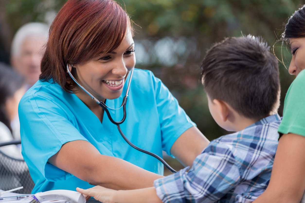 Nurse checking vitals as part of United Way support