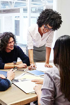 work colleagues around a table