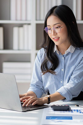 woman accessing Chubb Agent Portal from laptop