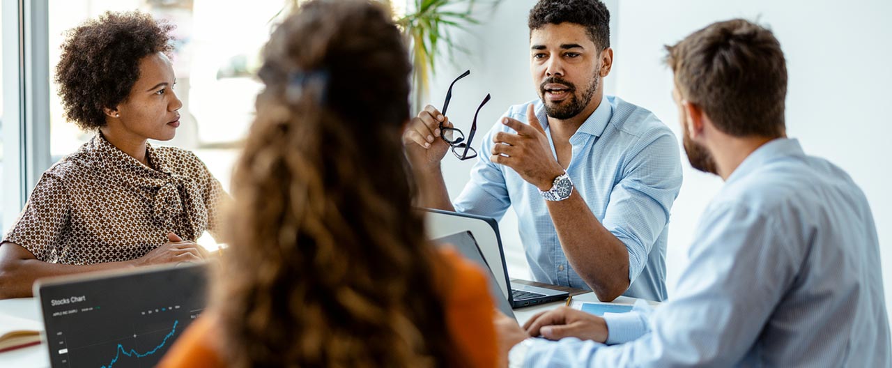 people meeting discussing surety and fidelity reinsurance