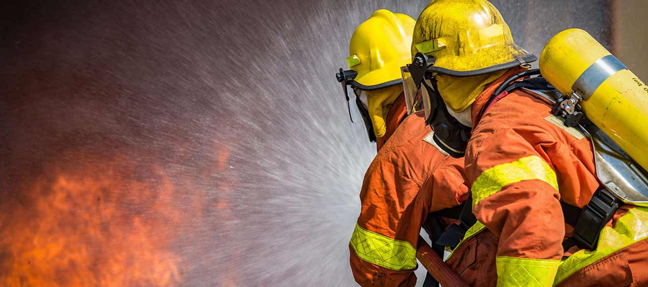 fire fighters battling fire