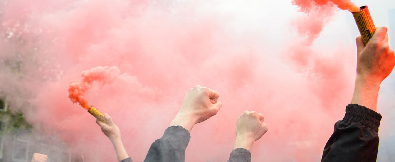 hands raised in protest