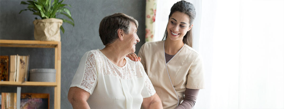 therapist assists a patient