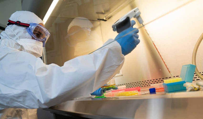 scientist working in life sciences cleanroom