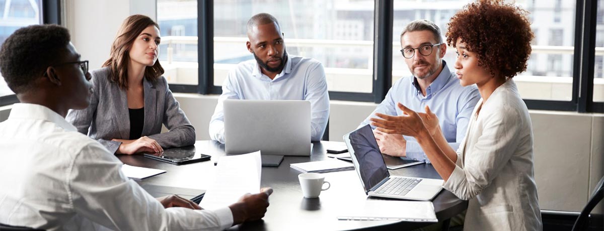 colleagues reviewing banks and financial institutions reports