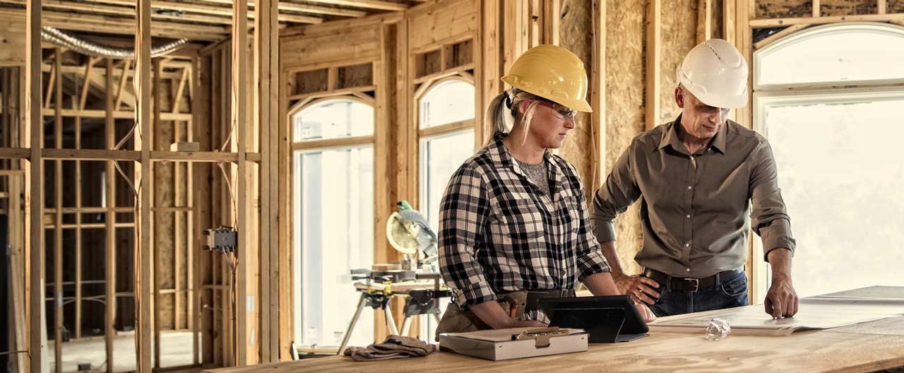 woman and man working on home renovation