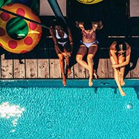 relaxing by pool