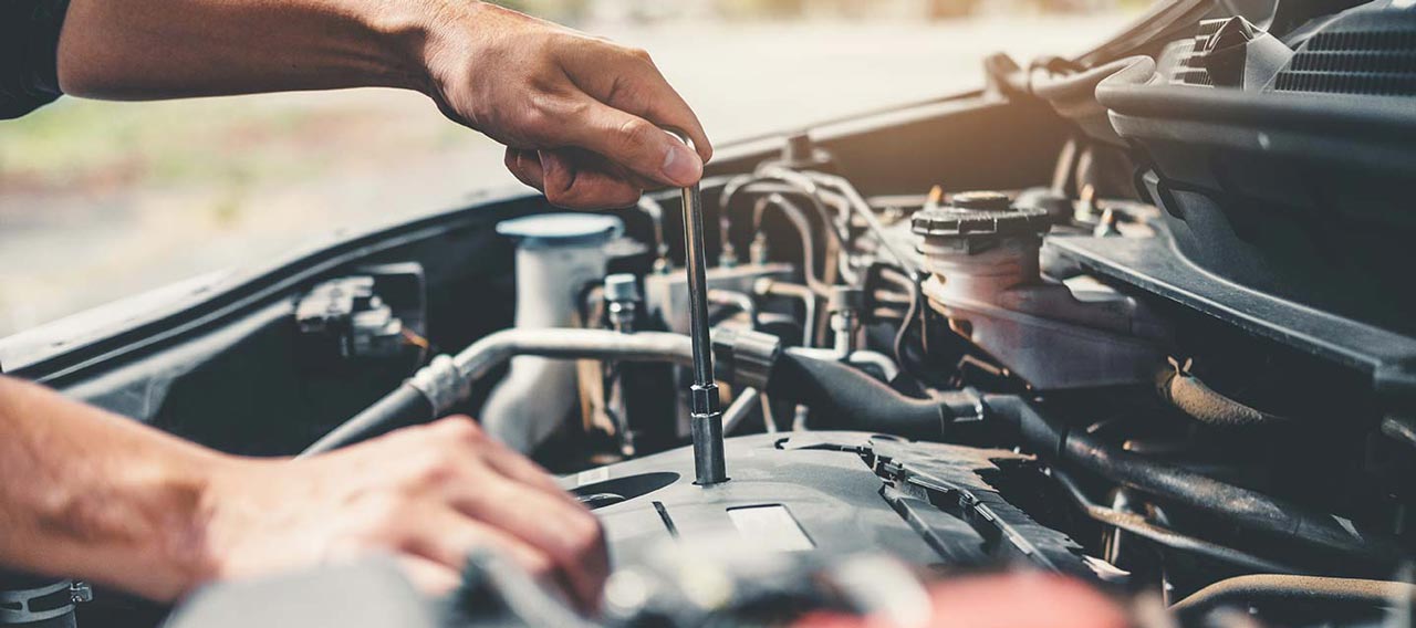 mechanic fixing car